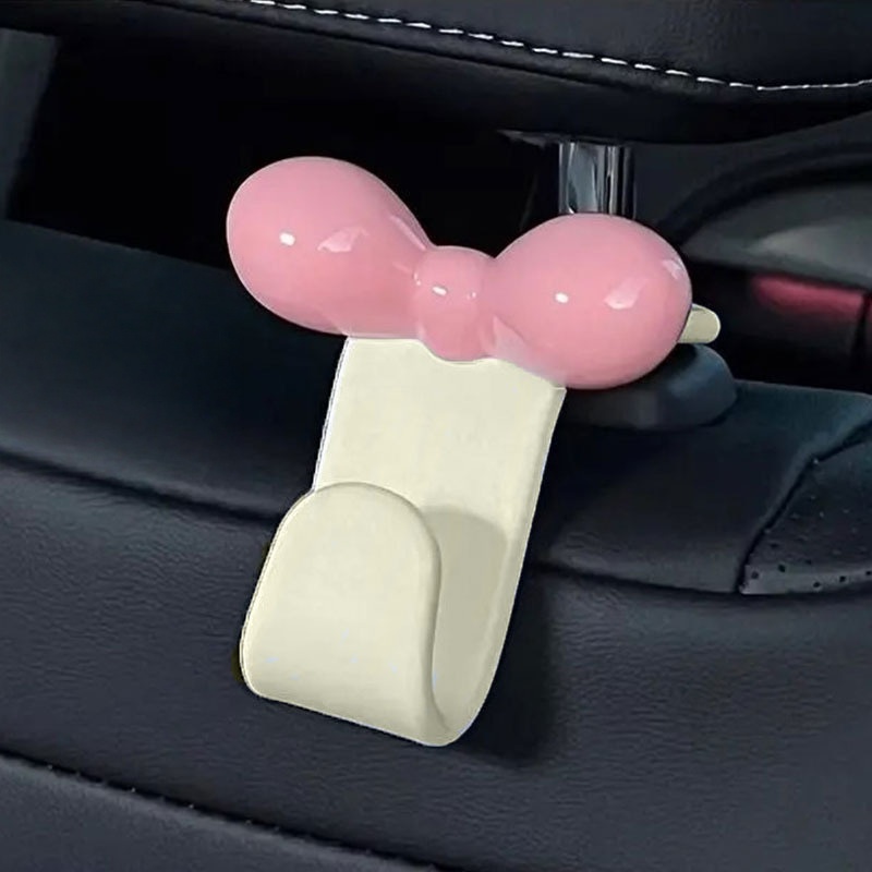 Travel Accessories Pack - ミニマリストなボウ型車用後部座席吊り下げフック、実用的な収納アクセサリー、ハンドバッグ、軽食、車内旅行用品用